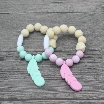 

New Baby Feather Silicone Bracelet Molar Care Teether Bite Bracelet Bracelet Silicone Teether Baby Bracelet