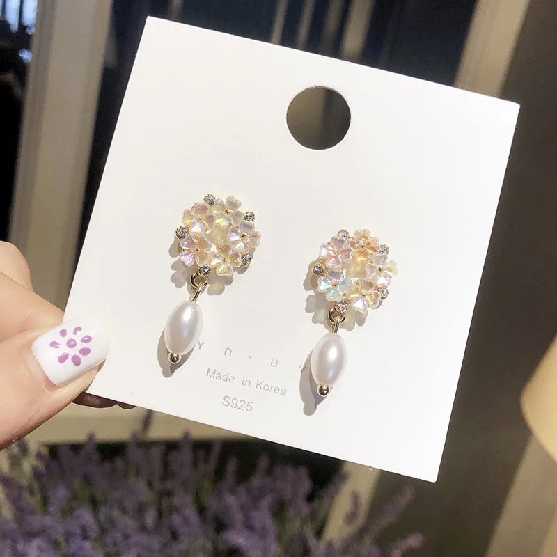 

Pearl earrings Silver earrings 925 ladies earrings Silver needle Shell flower pearl fringed pearl Lotus star earrings E702-1H