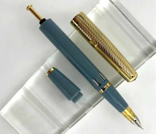 

Wing Sung 601A Twill Golden Cap Vacumatic Fountain Pen Fine Nib Window Lake Blue