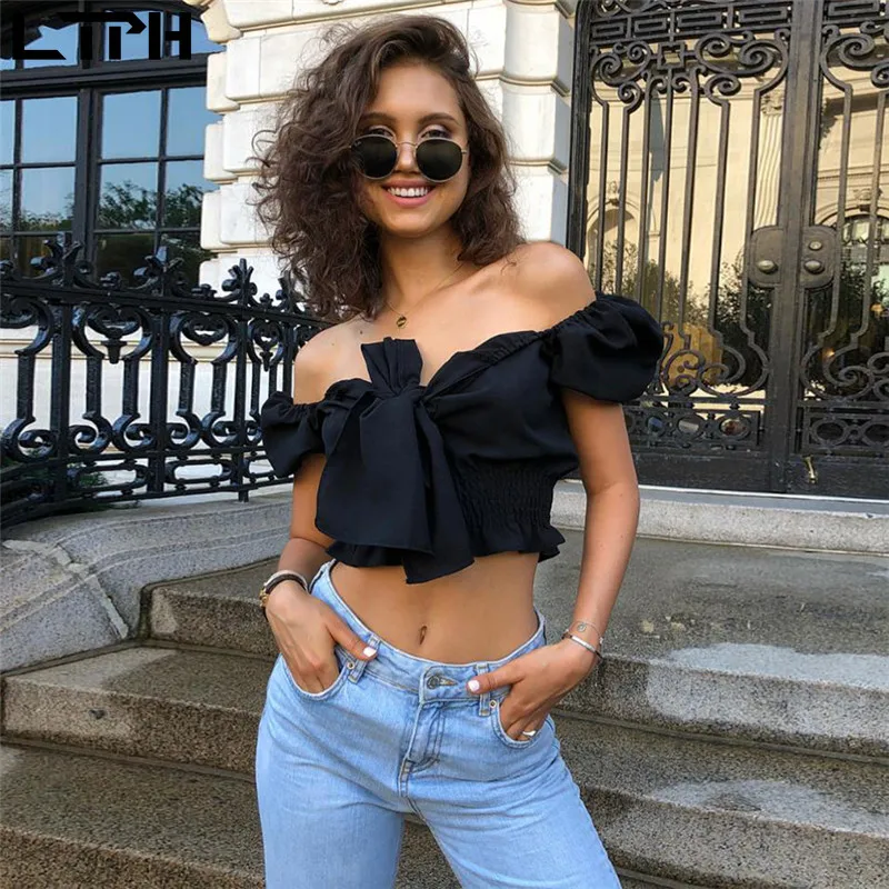 

Hot sale New 2020 palace Vintage womens tops and blouses Slash neck bow tie straps Sexy dew navel Solid color Puff sleeve shirt