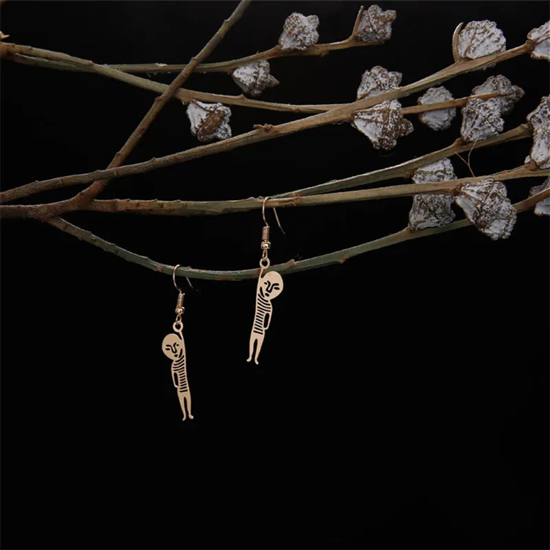 

Fashionable joker character small hollow-out lonely little idea wacky abstract s925 silver allergy free earrings