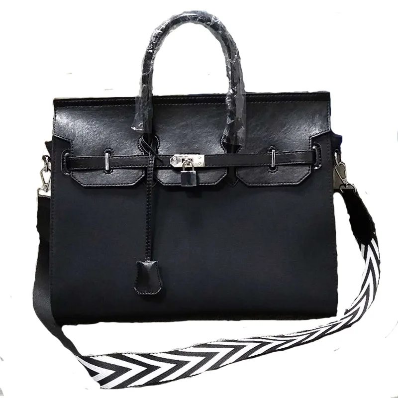 

2019 spring/summer fashion new graffiti canvas ultrafine piotte platinum handbag for ladies