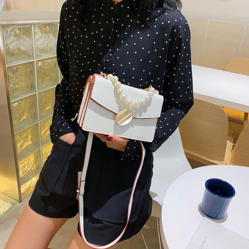 

Foreign gas woman 2019 new Korean version of the texture pearl handbag 100 lap shoulder slanted small square bag