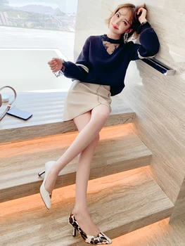 

Fake two piece stitching mesh embroidered hollow top + zipper small leather skirt suit female 2020 autumn new style