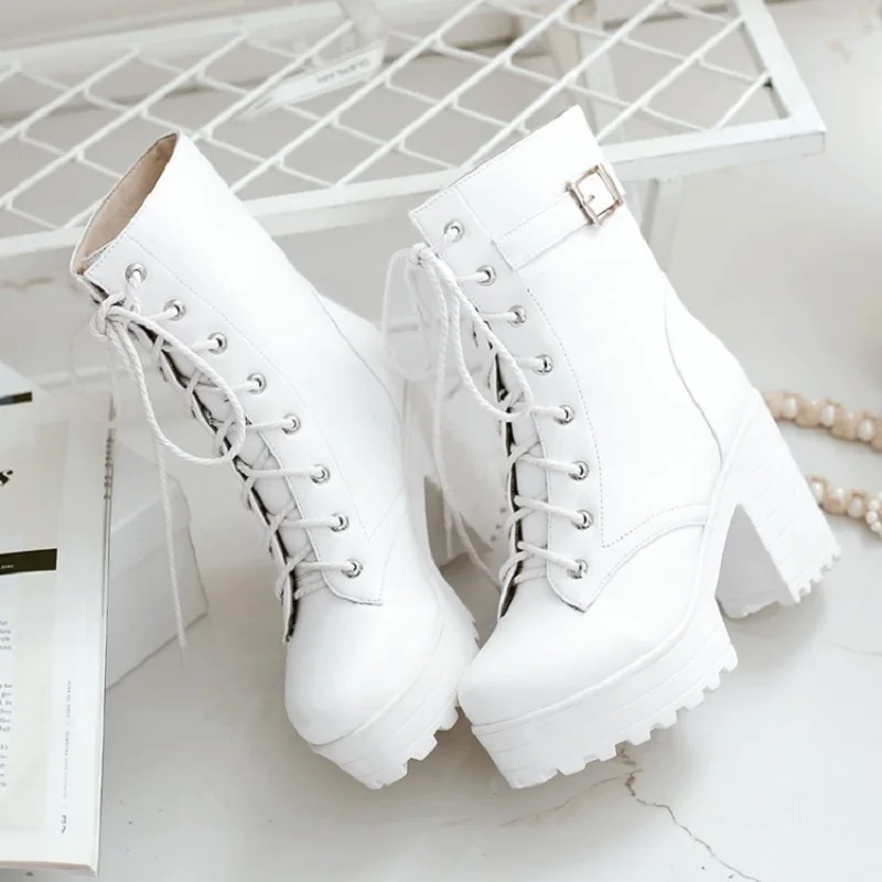 

Spring and autumn new trend cross strap 10CM high heel Martin boots fashion Lolita foreign trade large size women's boots.