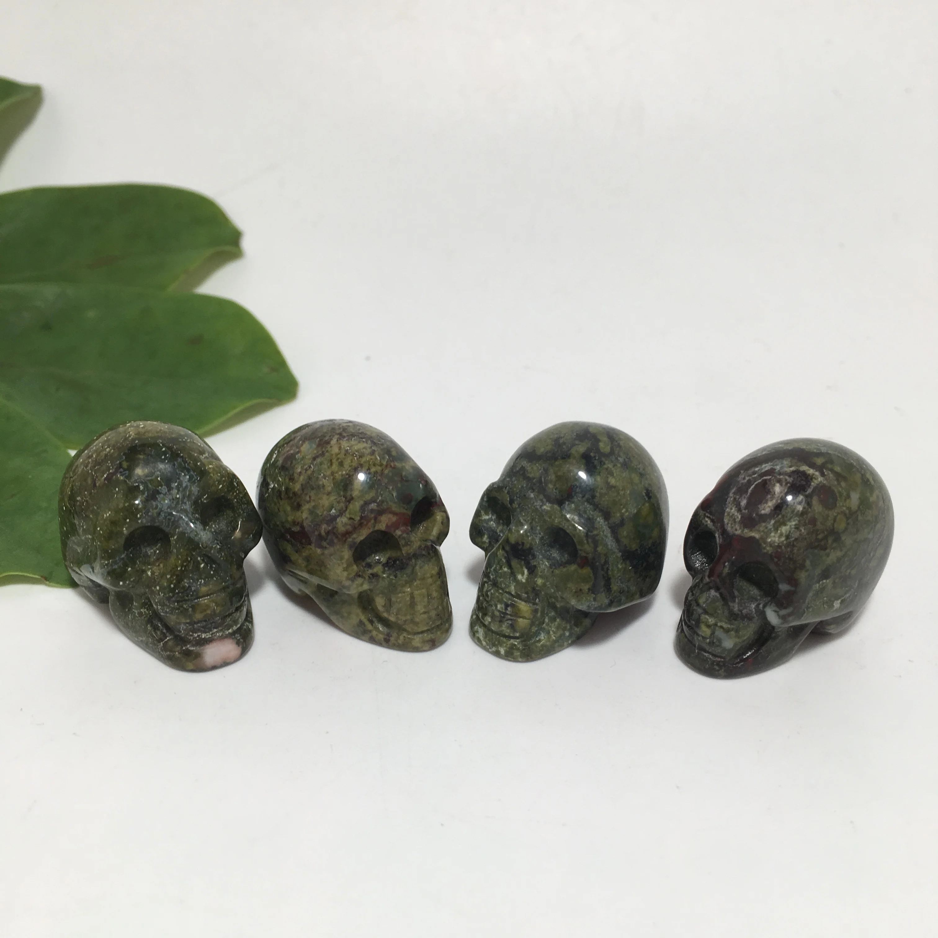 

Z 1 inch Natural Dragon blood stone Skull Crystal Carved Statue Realistic Feng Shui Healing Home Ornament Art Collectible