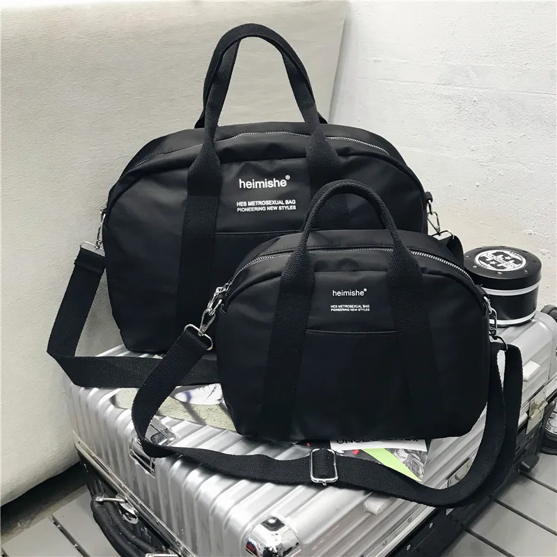 

Large capacity portable travel bag waterproof nylon bag Joker outdoor travel bag fashion shoulder slung handbag