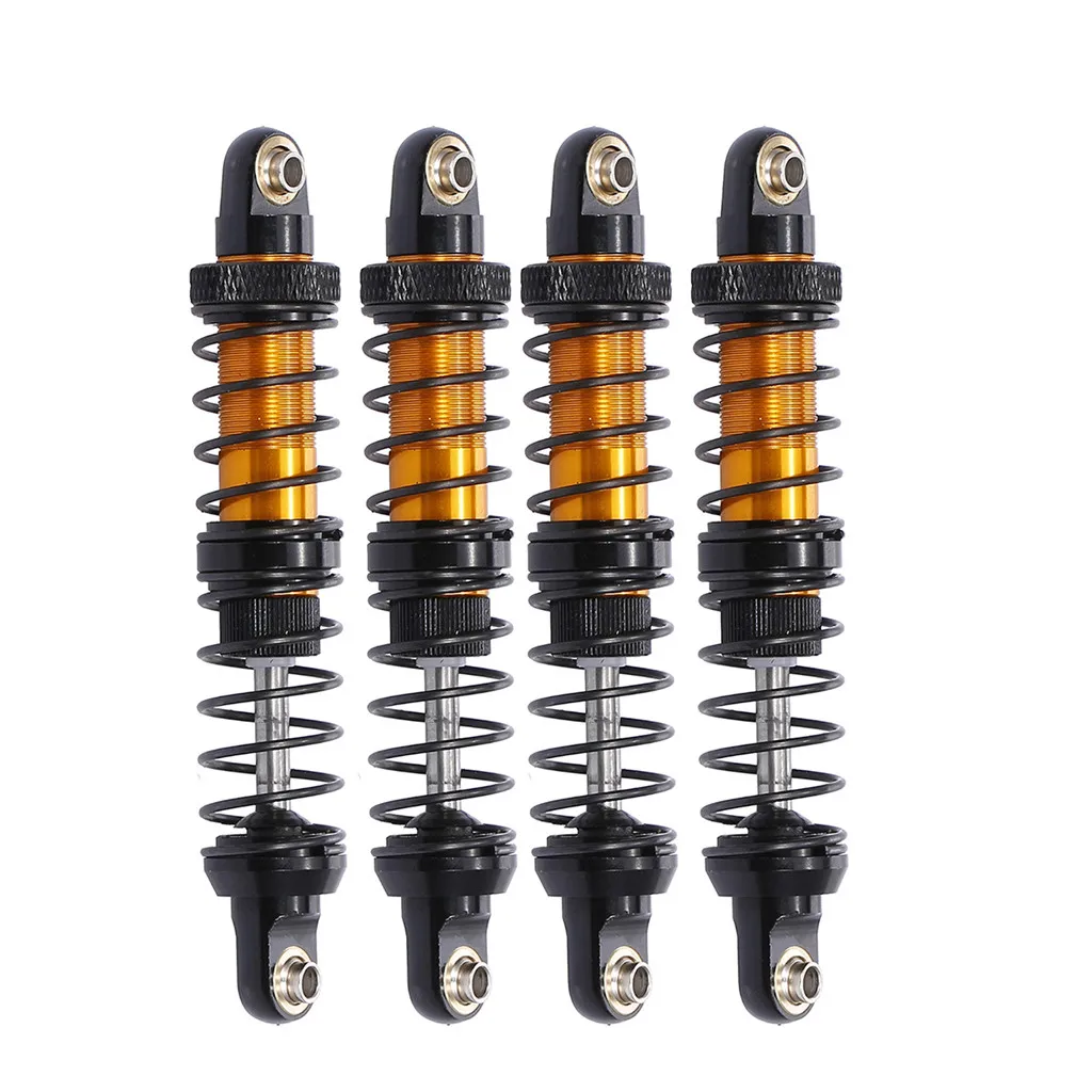 Pneus de rechange pour voiture RC jaune et rouge, 100mm, montrés sur une surface texturée
