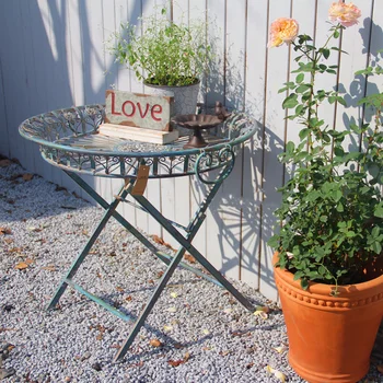 

beautiful round rustic metal folding side table