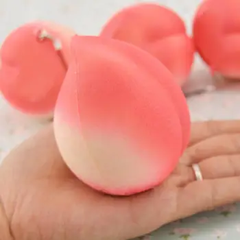

1PCS Christmas Gift Present New Arrival Bag Accessories Colossal Peach Slow Rising Cream Scented Kids Toy