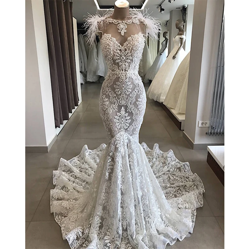 

Luxury Beaded Mermaid Wedding Dresses 2019 With Feather Appliqued Backless Wedding Gowns Court Train Bride Dress Robe De Mariee