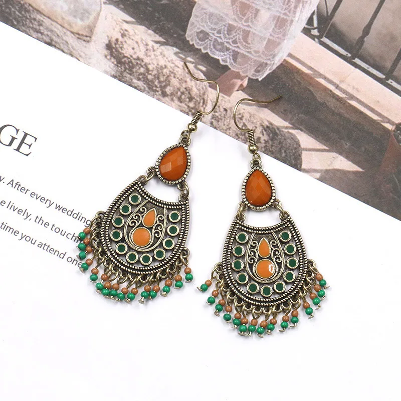 

Bohemian National style jewelry fashion palace style decorative alloy earrings with red gemstones and pearl eardrops for women
