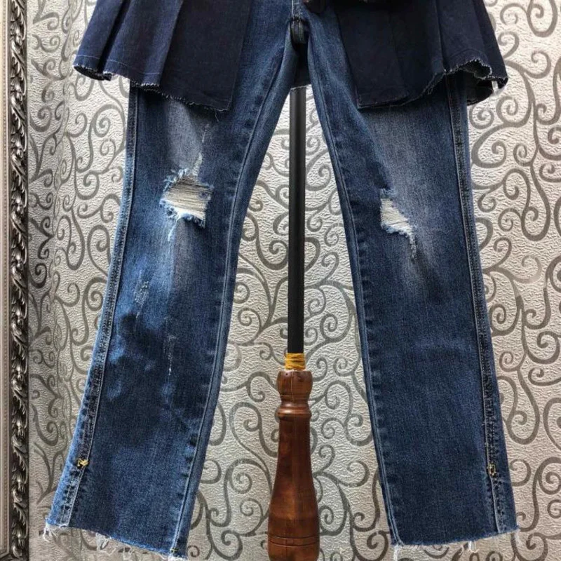 [EWQ] Новинка осени, сшитые джинсы с оборками и дырками, имитация двух частей, корейский стиль, высокая талия, облегающие черные брюки QL57401