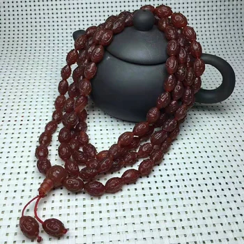 

Natural silk wrapped 108 grain rice bead ripple Bead Necklace