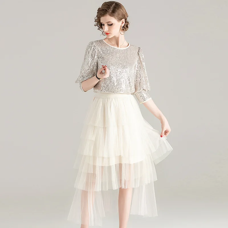 Rok Set 2020 Vrouwen Nieuwe Mode Ronde Hals Drie Kwart Mouw Sequin Top + Elastische Taille Onregelmatige Mesh Rok Twee delige Set Rok Set 2020 Vrouwen Nieuwe Mode Ronde Hals Drie Kwart Mouw Sequin Top + Elastische Taille Onregelmatige Mesh Rok Twee delige Set