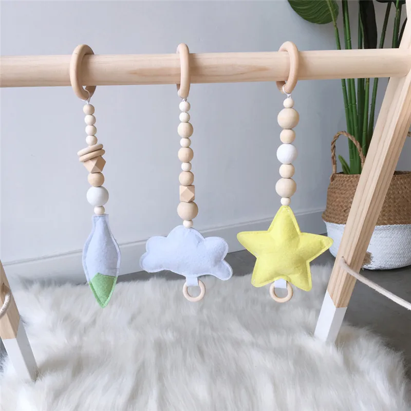 

Baby Wooden Rattle Cotton Filling Infant Bed Bell Kids Room Decoration Toys Star Felt Hanging Play Gym Soft Baby Wooden Rattle