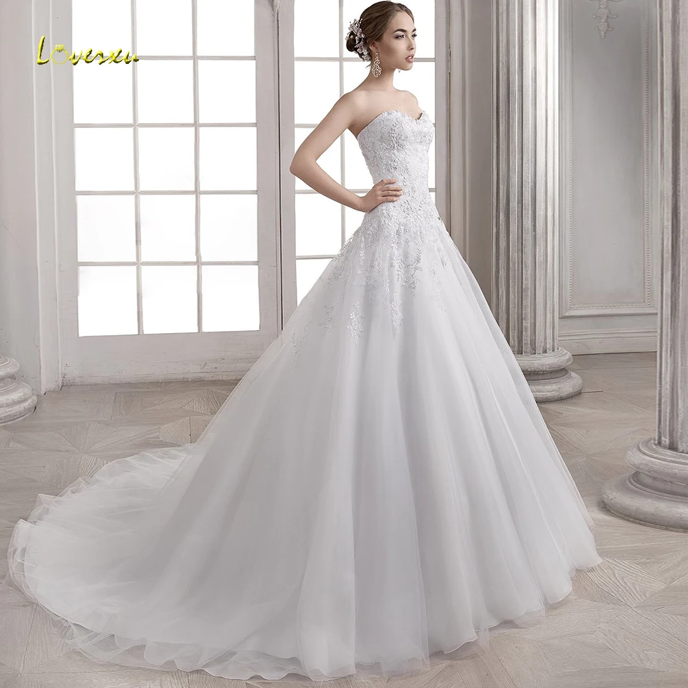 

Loverxu Sweetheart A Line Wedding Dresses 2019 Elegant Applique Beading Sleeveless Bride Dress Court Train Bridal Gown Plus Size