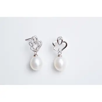 

Silver Earring zirconitas and cultured pearl Sweetwater. Model petals