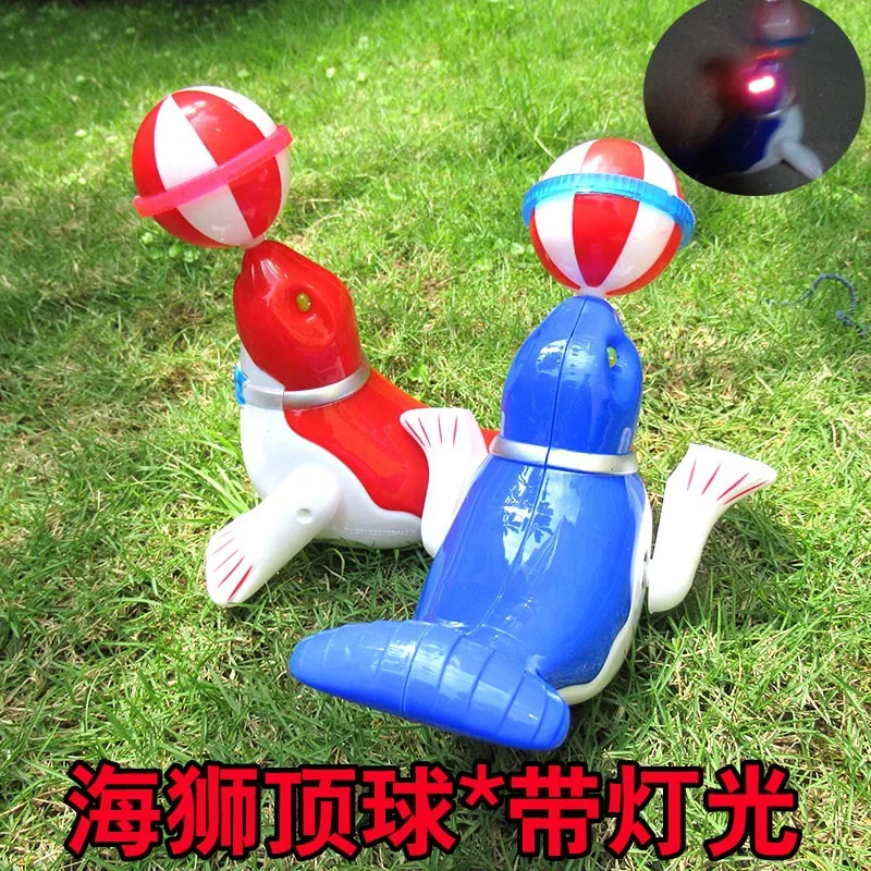

226 Electric Sea Lions Pop And Tip/Dolphin Pop And Tip Rotating Shining Street Stall Hot Selling Supply of Goods Toy