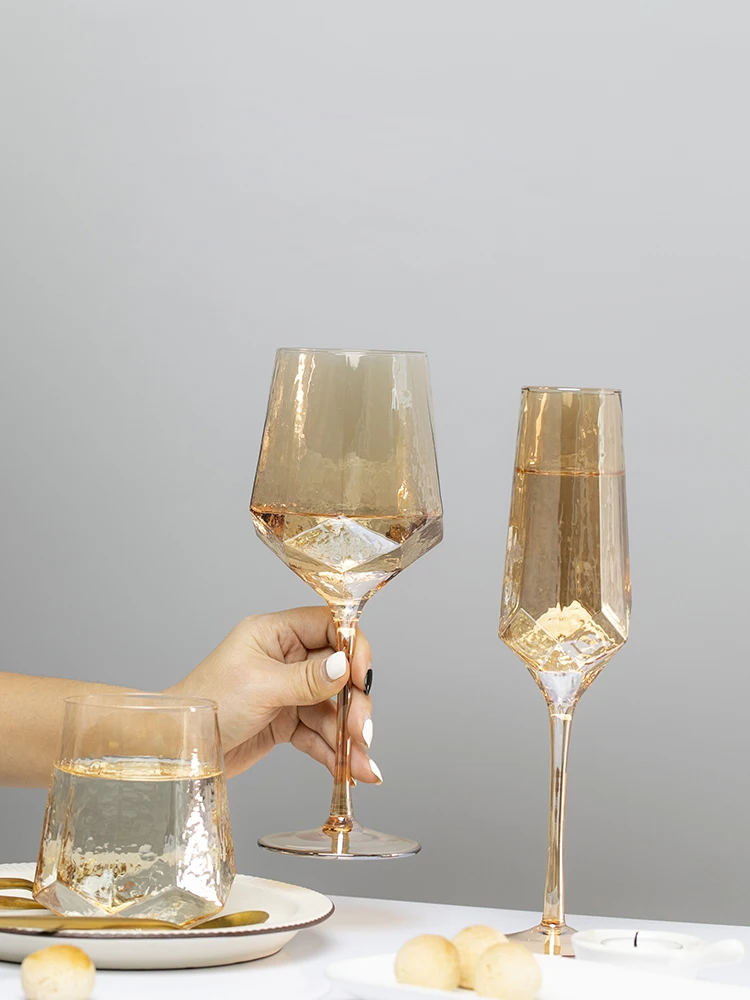 https://ae01.alicdn.com/kf/H0cb9951c48cd45b795c7772a09819364u/Luxury-Golden-Amber-Wine-Glasses-Lead-Free-Crystal-Goblet-Champagne-Water-Cup-Nordic-Bar-Drinking-Wedding.jpg