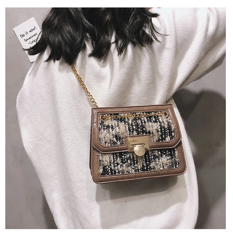 

Korean version of three-dimensional tweed Mao Mao socialite wind double pocket generous bag lock shoulder diagonal women's bag