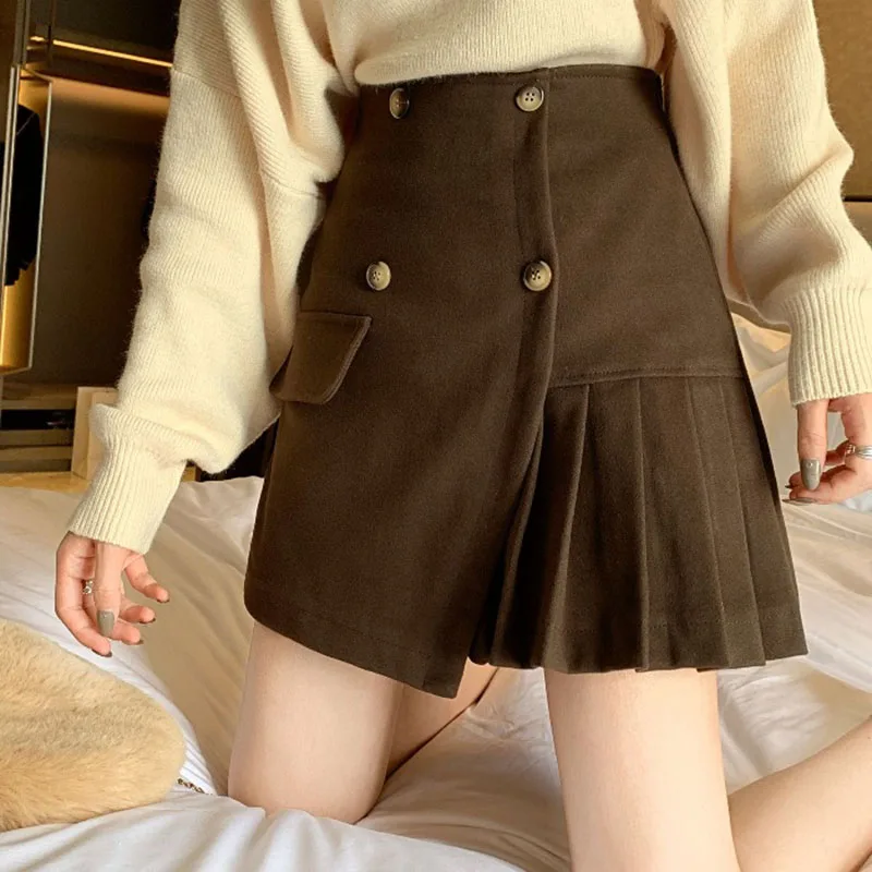 Женская осенне-зимняя юбка, новинка, трапециевидная короткая юбка, Женская нестандартная юбка с высокой талией, Однотонная юбка на пуговицах, мини плиссированная юбка ML262