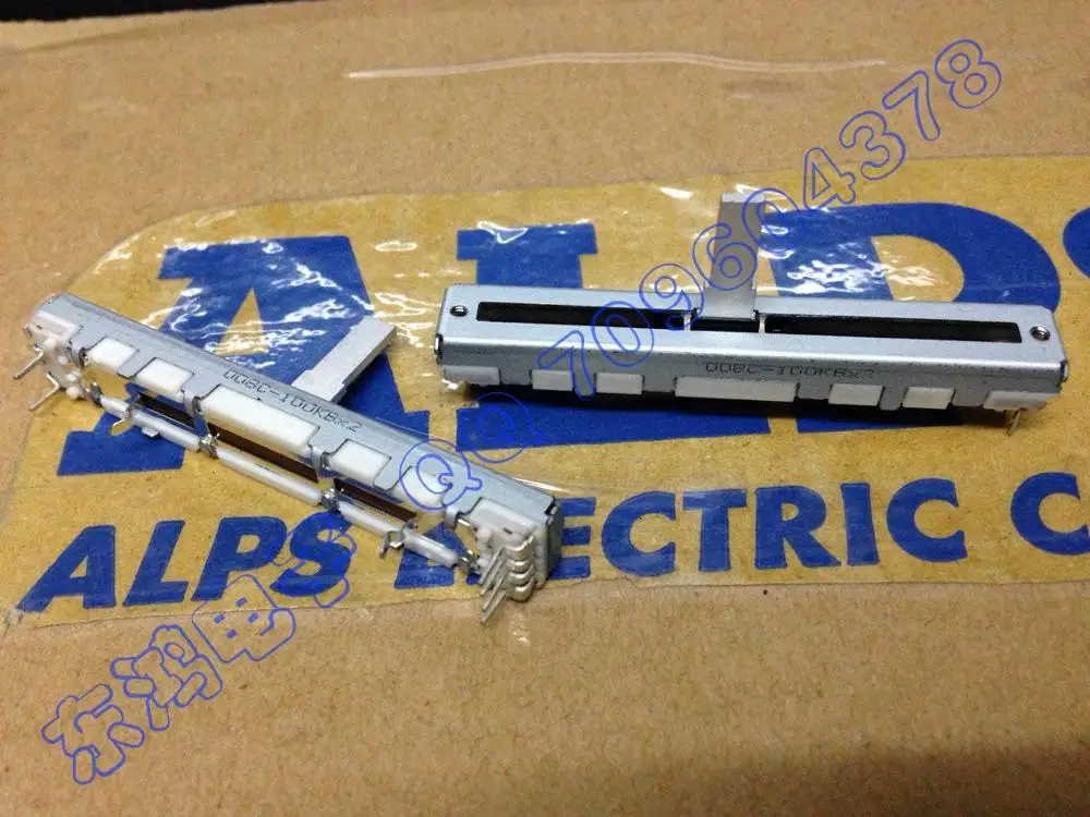 

2PCS/LOT ALPS 6 cm slide potentiometer B100KX2 with center fixed shaft length 15MM..