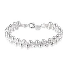 Модный, креативный, красивый браслет в этническом стиле с глянцевыми бусинами