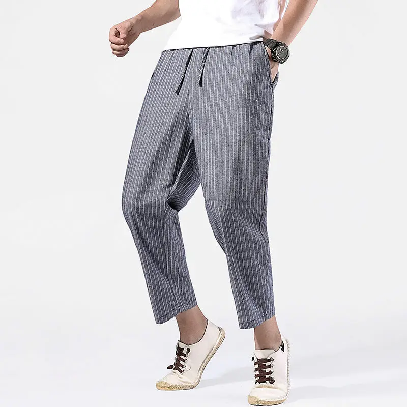 

Men's casual pants 2020 spring and summer new solid color elastic drawstring nine-point pants young fashion men's clothing