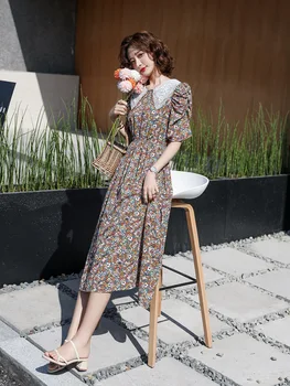 

Floral dress 2020 temperament doll collar printed elastic waist skirt medium and long dress