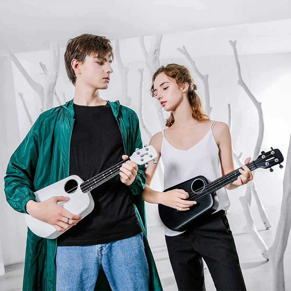 Умная акустическая гитара popumusic poputar t2. Электрогитара ксиаоми. Портативная миди гитара. Jamstik гитара. Умная гитара.