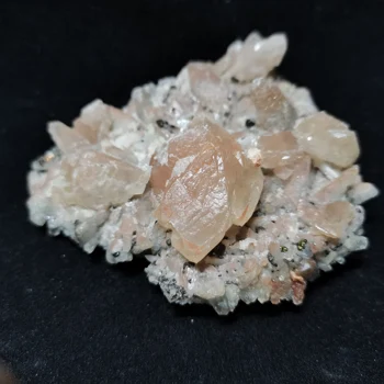 

142.4gMineral samples of natural pink calcite and pyrite Association