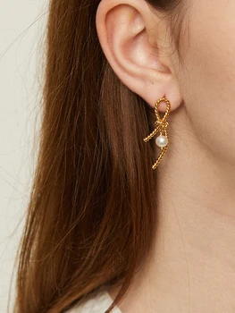 

Timeless Wonder Natural Pearl Bowknot Statement Stud Earrings Women Jewelry Gothic Boho Designer Ins Fancy Trendy Rare Kpop 3168