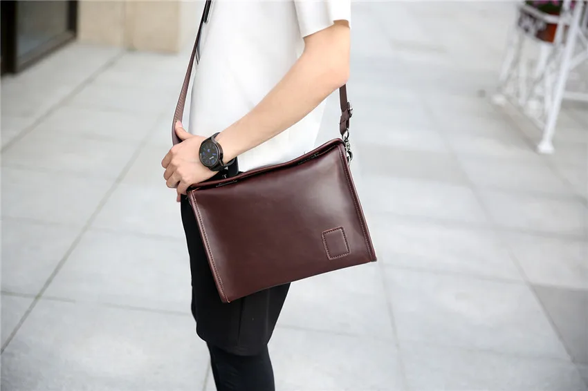 

Men's bag men's retro shoulder bag double buckle diagonal bag trend briefcase tide