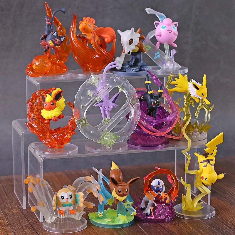 

6pcs/set Anime Eevee Swift Vulpix Fire Spin Jolteon Discharge Umbreon Dark Pulse Flareon Flare Blitz Figure Dolls Toy