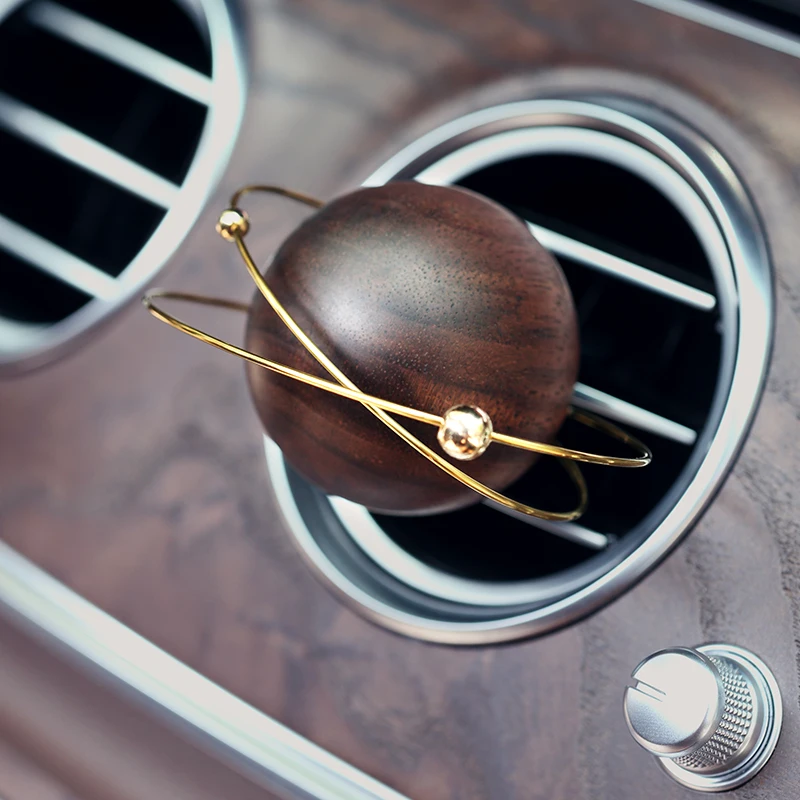 

Walnut Wood Car Decoration Essential Oil Aroma Diffuser Asteroid Planet Design Car Interior Air Outlet Aromatherapy Diffuser