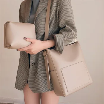 

Quality PU Single shoulder bag female 2019 new wave Korean version simple solid color large capacity 2 Pcs/set bag.