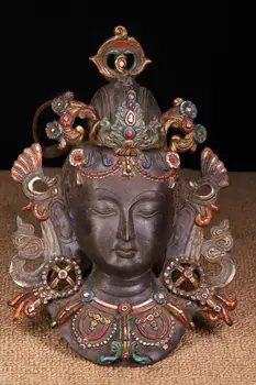 

wedding decoration Copper tires are hand-beating, chiseled, and painted with three statues of Buddha