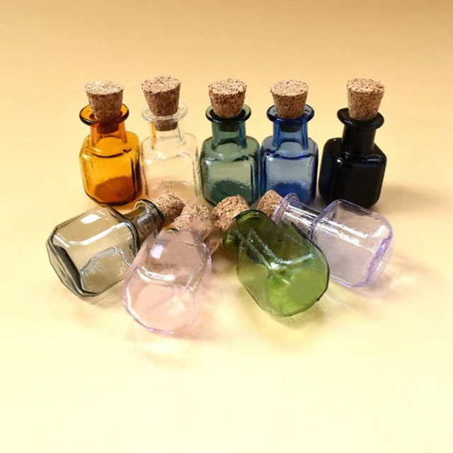 Small colored glass bottles