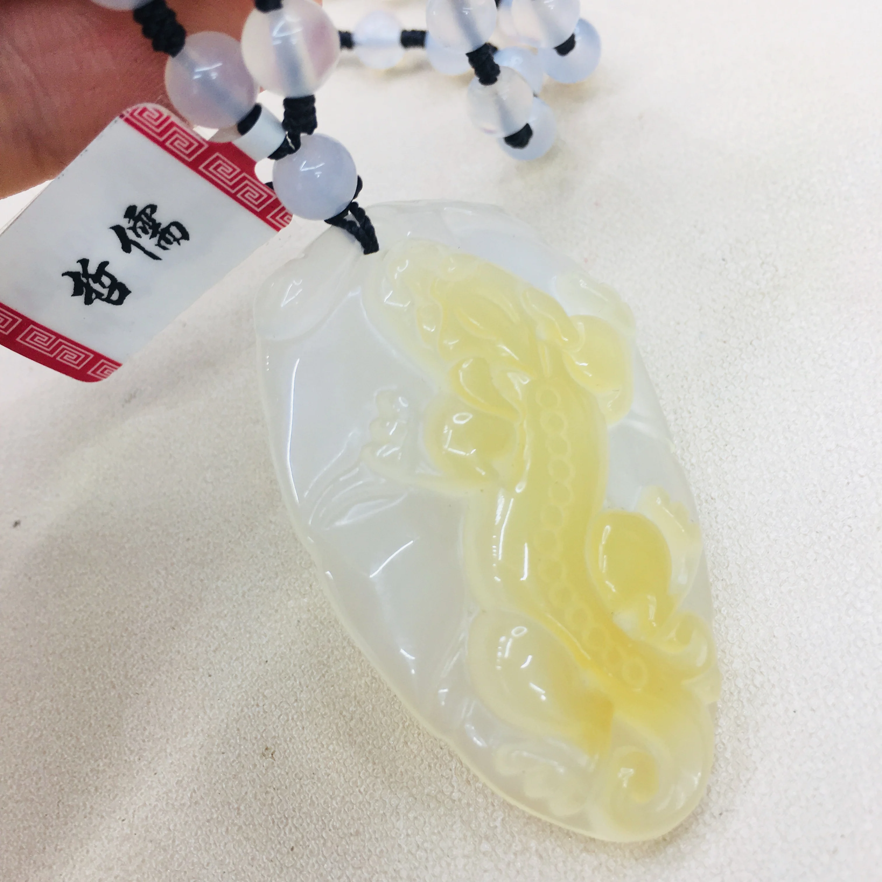 

Natural Brazilian ice bottom chalcedony jade carving two-color leaves pixou pendant with chalcedony beads necklace sweater chain