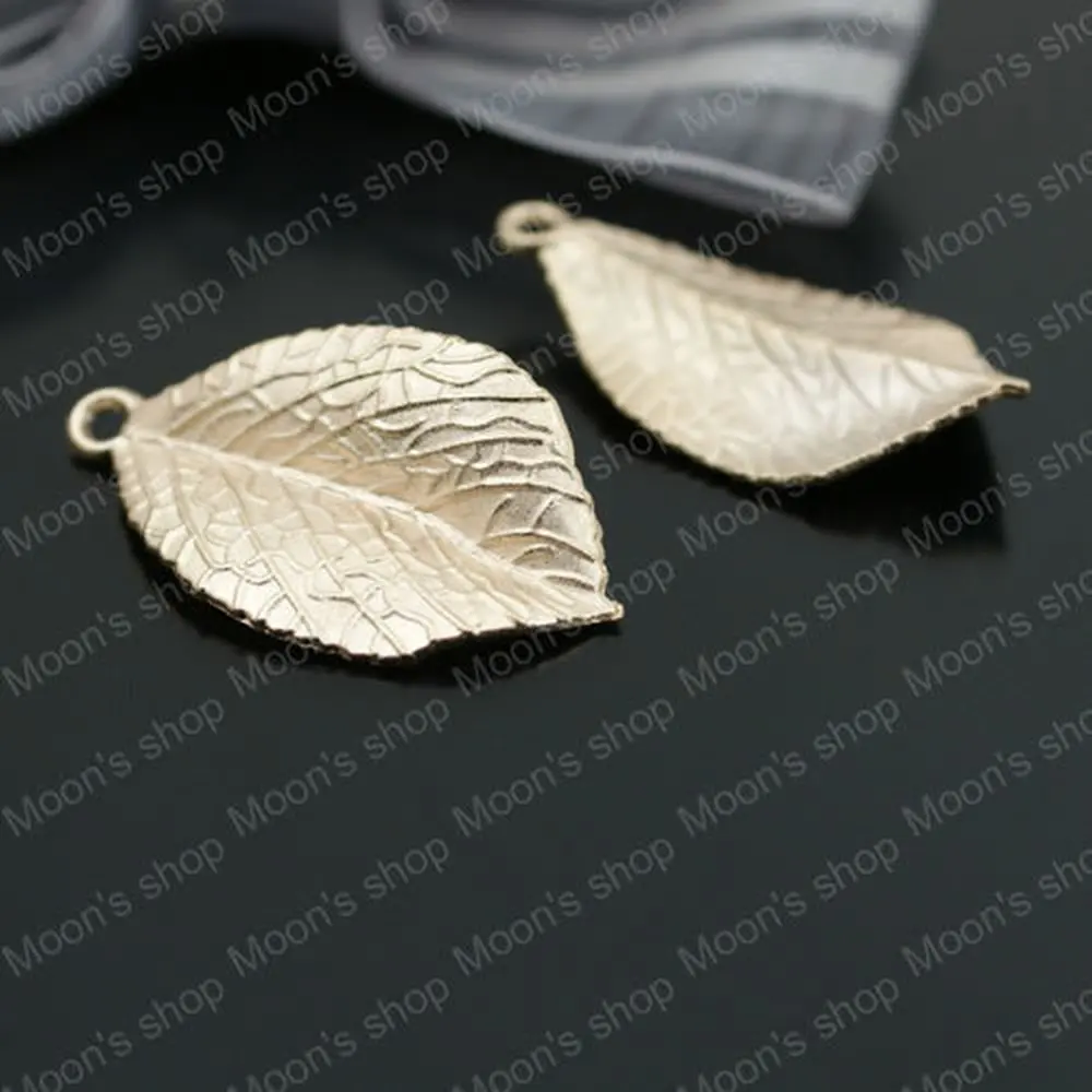 

Wholesale 35*20mm Champagne Gold color Tree Leaf Alloy Charms Pendants Diy Fashion Jewelry Findings Accessories 10pcs(JM143)
