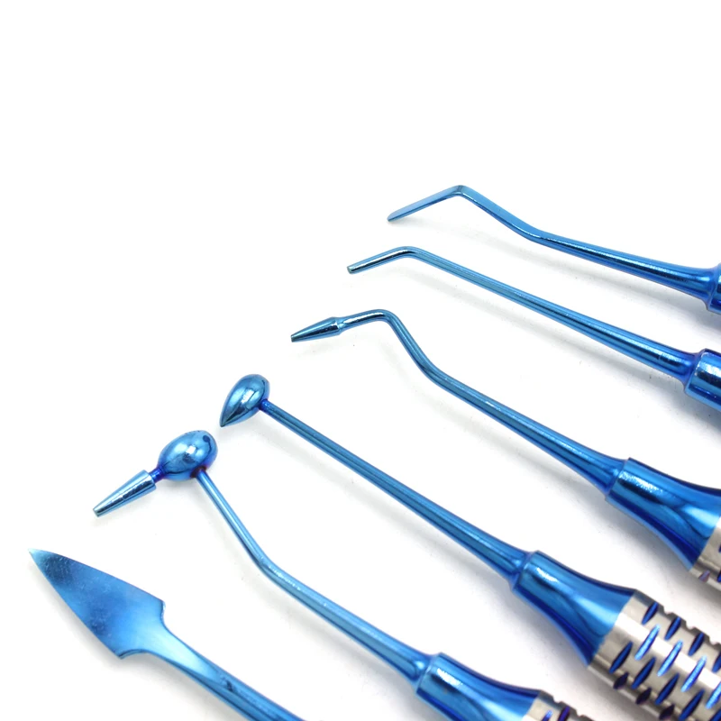 Kopen 6pcs Dental Composiet Hars Vullen Spatel Titanium plated Hoofd Hars Filler Set dikke handvat Restauratie set Tandheelkundige Instrument