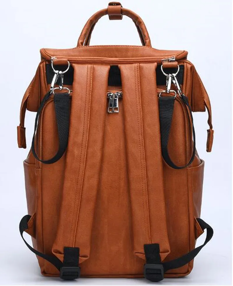 New Unisex nappy bag Fashion Quality PU Leather Baby Diaper Bag bolsa maternidade Backpack+Changing Pad+Stroller Straps