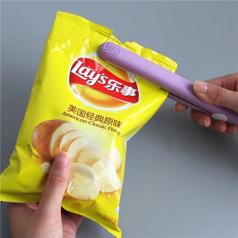 Creative-Practical-Household-Multifuncational-Food-Vacuum-Sealer-Bag-Clip-Handheld-Mini-Portable-Electric-Heat-Sealing-Machine (1)