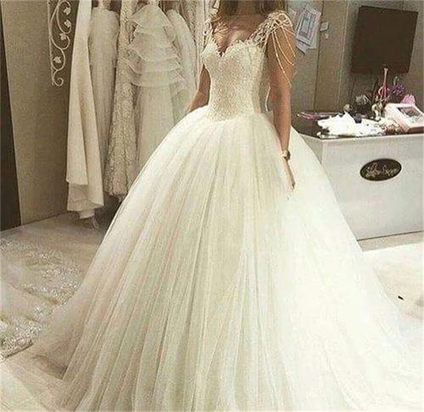 NUOXIFANG-Sexy-High-Quality-Lace-A-Line-Elegant-White-Ivory-Beaded-Wedding-Dress-2020-Bride-Dresses.jpg_.webp_Q90.jpg_.webp_.webp