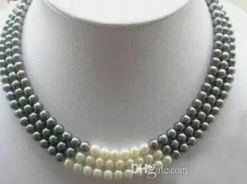 

3 rows of 7-8 MM black and white natural pearl necklace 17-19 "