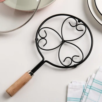 

Hot stand on legs, with a handle 20 × 32 cm "Hearts", black