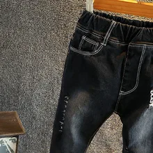 Г. Зимние новые стильные детские джинсы в Корейском стиле плотные эластичные ковбойские обтягивающие штаны с принтом смайлика для мужчин и женщин