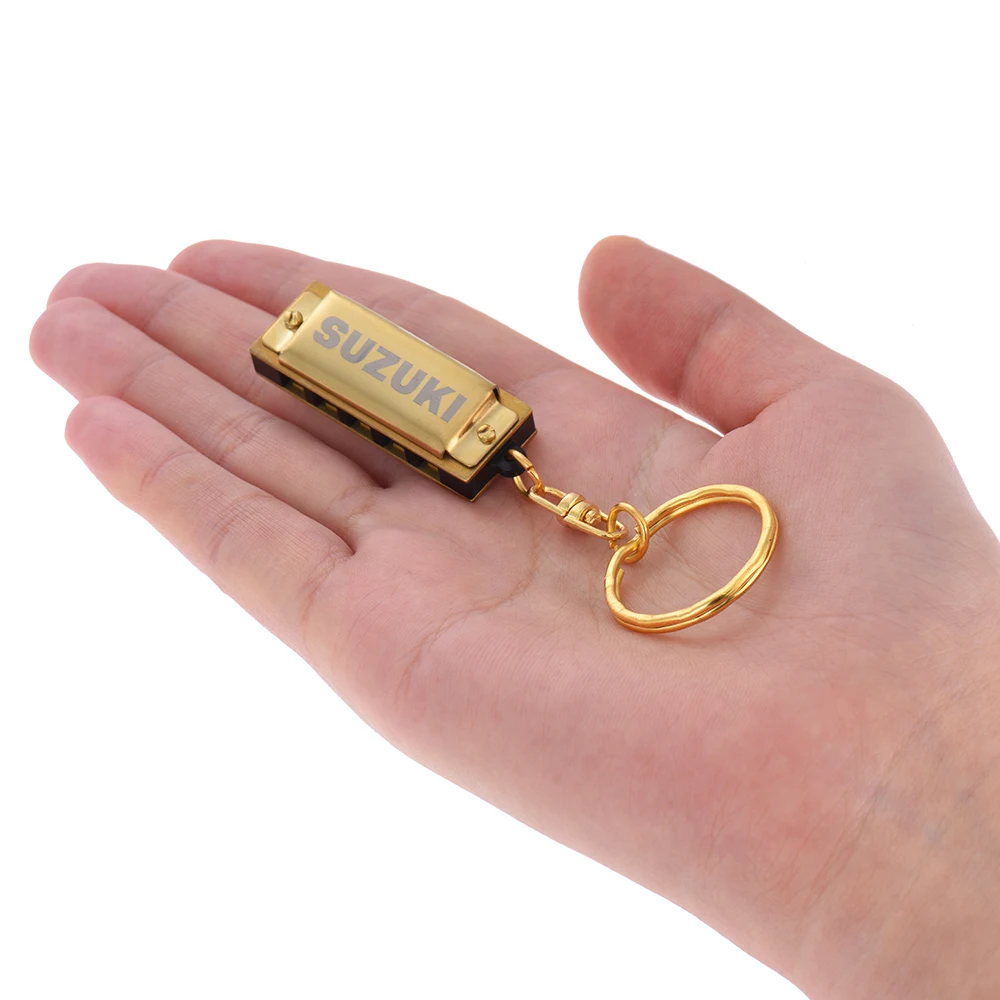 

Mini Harmonica Key of C 5 Holes 10 Tone Harmonica Keychain Golden Woodwind Instruments