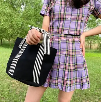 

Women's new fashion striped portable bowknot casual canvas handbag